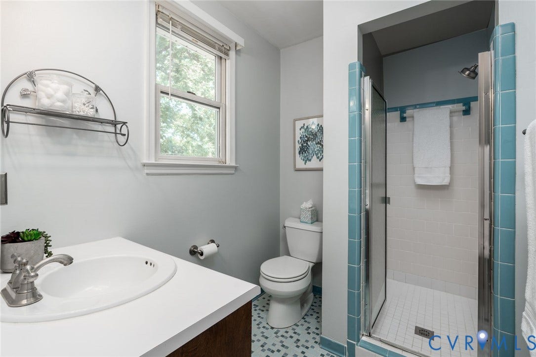14613 Gimbel Drive, Chester, VA 23836 White vanity with integrated sink and brushed nickel faucet