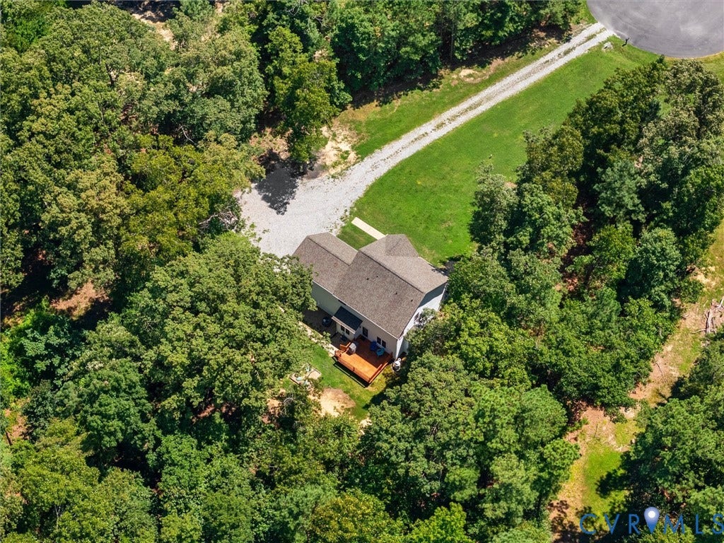 8200 Madeline Court, Strath Woods, Henrico, VA 23231 Secluded property featuring a light-colored exterior and a dark shingled roof