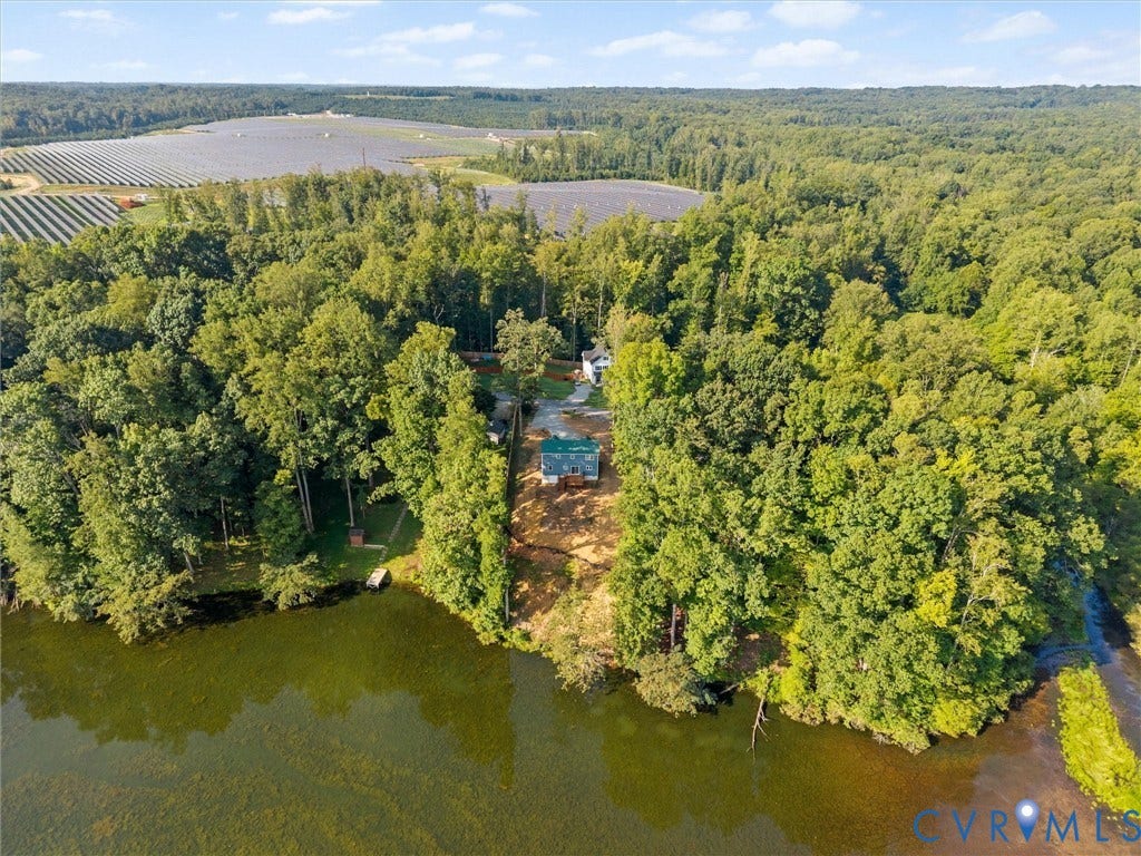2224 Highland Drive, Powhatan, VA 23139 Waterfront property featuring extensive tree coverage and a private dock
