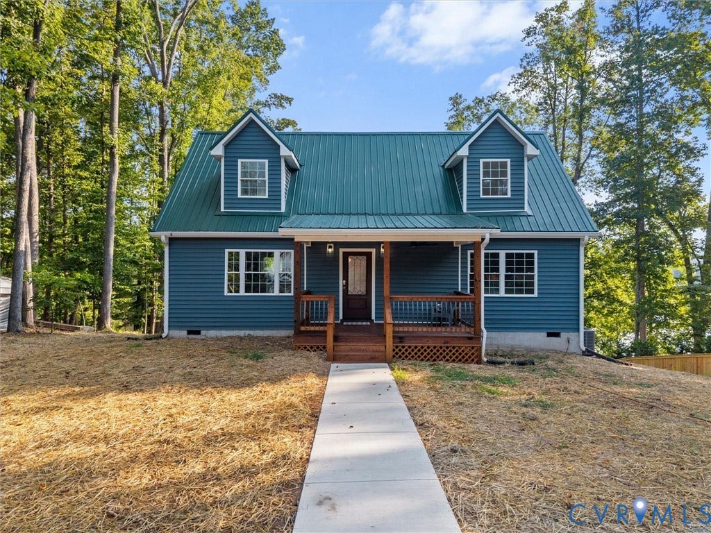 2224 Highland Drive, Powhatan, VA 23139 Blue horizontal siding exterior with a green metal roof
