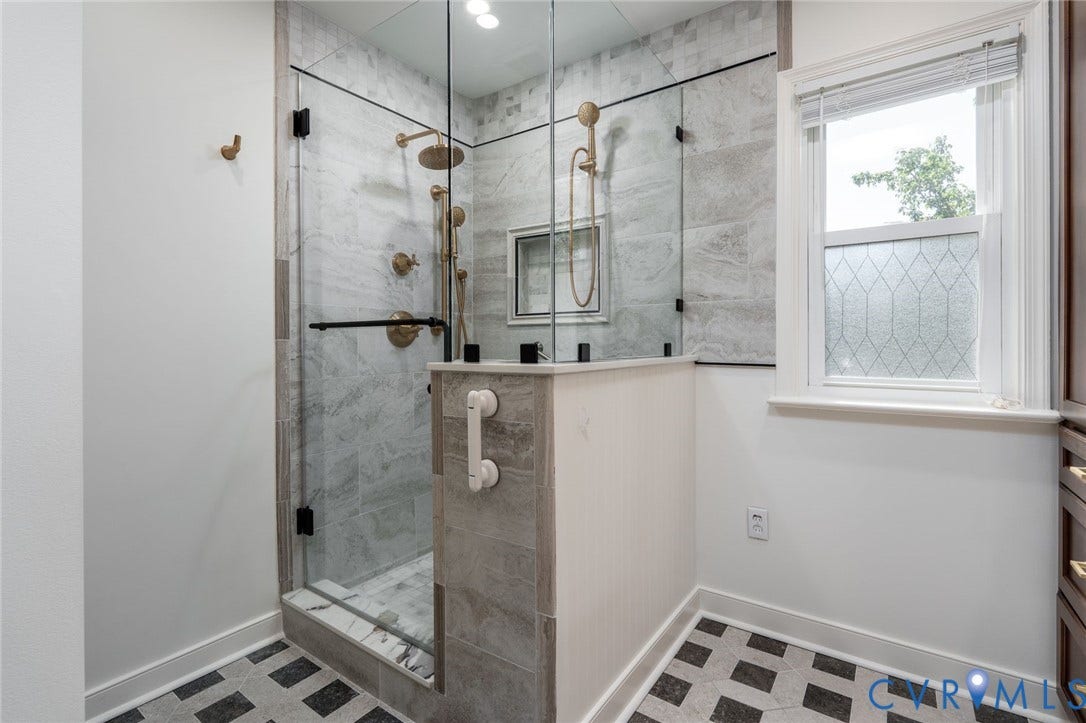 1719 Logwood Circle, Henrico, VA 23238 Primary bathroom: Glass-enclosed shower with a tiled interior, recessed niche, and multiple shower heads