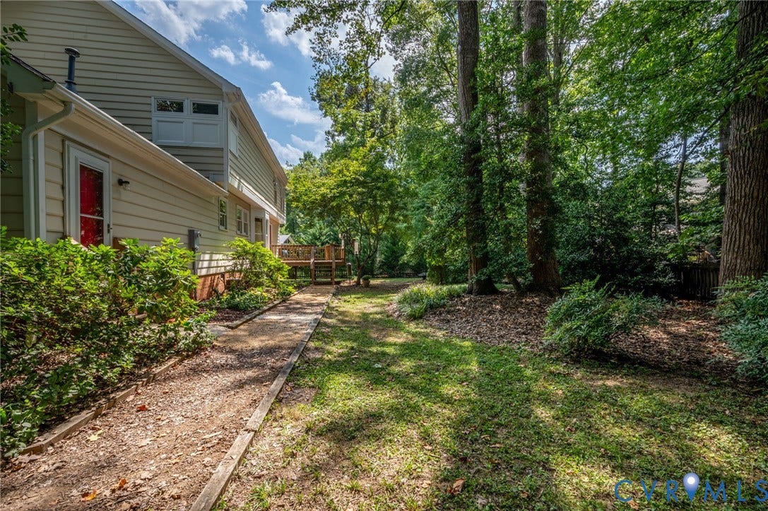 3704 Milbrier Place, Henrico, VA 23233 Wood-sided exterior with white trim and a rear deck