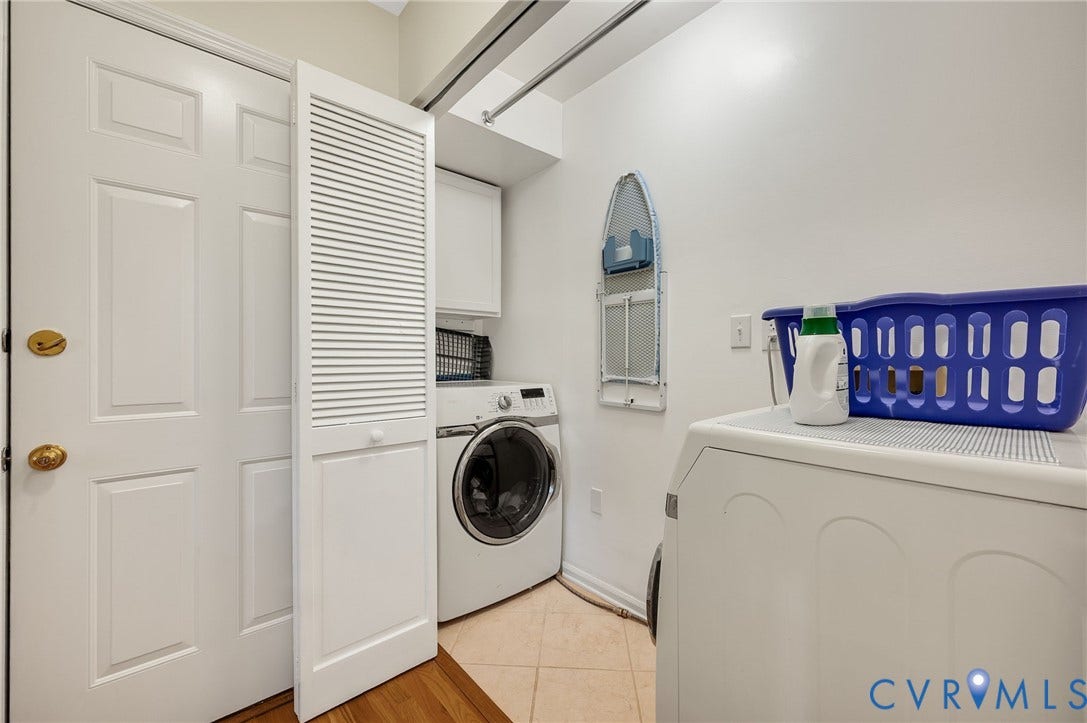 3704 Milbrier Place, Henrico, VA 23233 Tile flooring, white cabinetry, and a front-loading washer