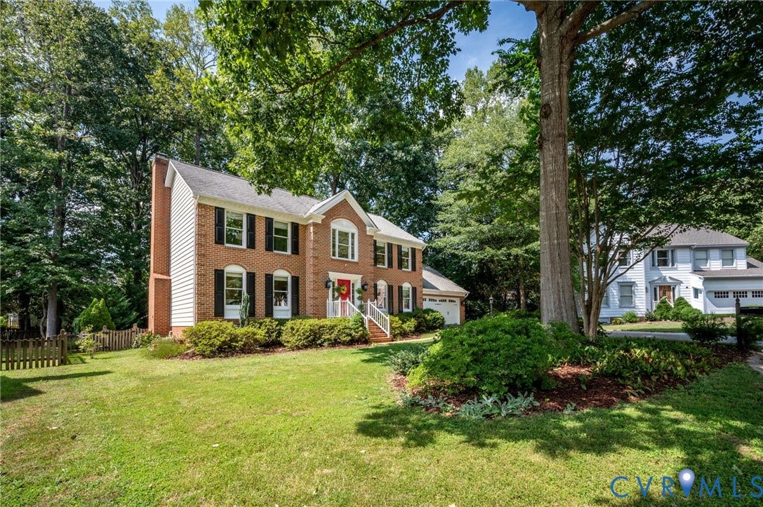 3704 Milbrier Place, Henrico, VA 23233 Traditional brick colonial exterior with white siding accents and a two-car garage