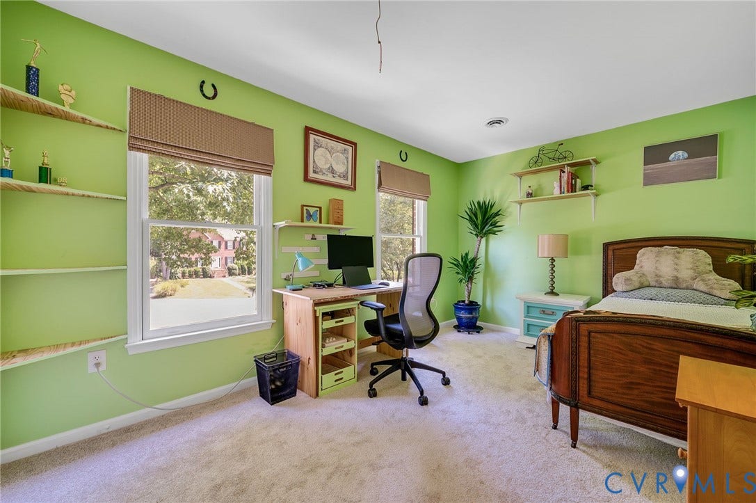 3704 Milbrier Place, Henrico, VA 23233 Built-in shelving, two windows with window treatments, a built-in desk, and carpeting