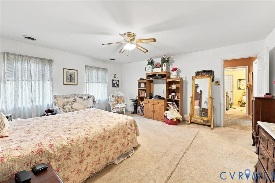 3819 Glen Oaks Court, Chester, VA 23831 Spacious room featuring neutral carpet flooring and white painted walls