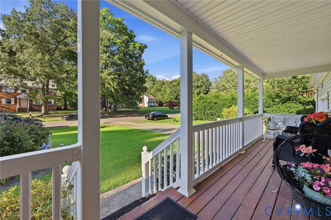 3819 Glen Oaks Court, Chester, VA 23831 Expansive covered front porch featuring wood-finish flooring, white balusters, and a paneled ceiling