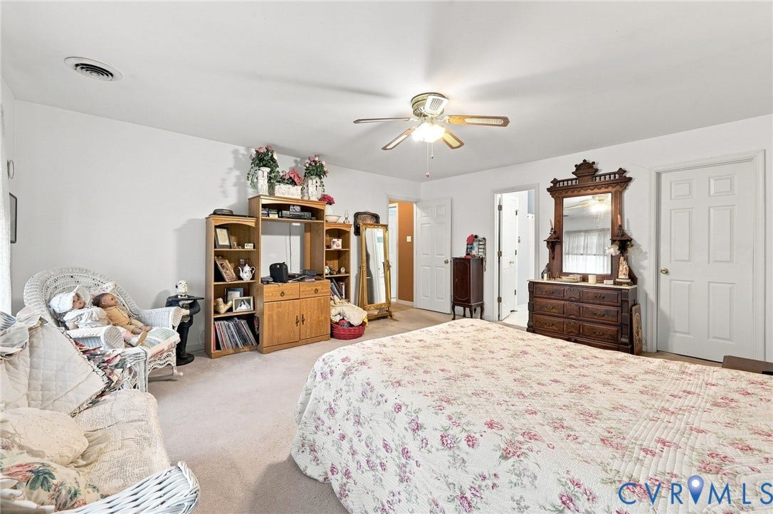 3819 Glen Oaks Court, Chester, VA 23831 Spacious room featuring neutral carpeting and white walls