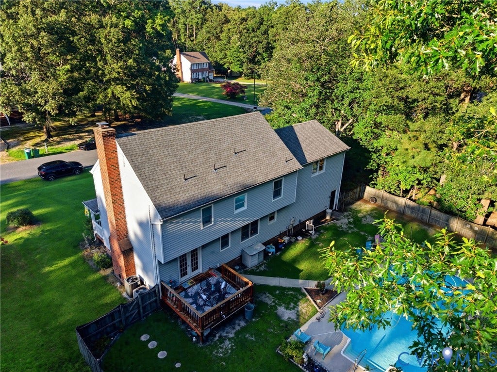 3819 Glen Oaks Court, Chester, VA 23831 Two-story residence featuring light blue siding and a dark gray shingle roof