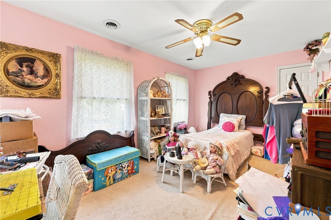 3819 Glen Oaks Court, Chester, VA 23831 Bright room featuring two windows with lace curtains, a ceiling fan with integrated lighting, soft carpet flooring, and a solid-core door