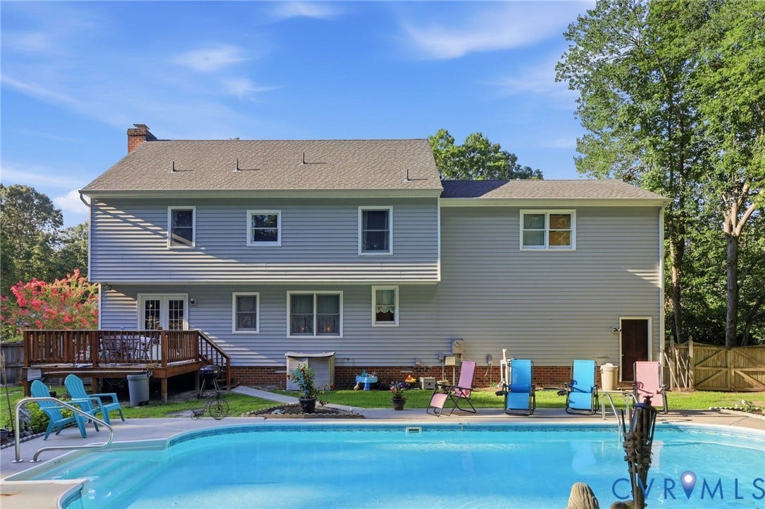 3819 Glen Oaks Court, Chester, VA 23831 Backyard oasis featuring an in-ground swimming pool with concrete surround