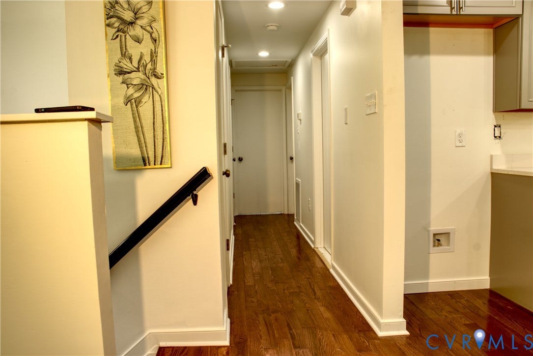 5004 Fairlake Lane, Henrico, VA 23060 Hardwood-style flooring throughout the hallway and kitchen area