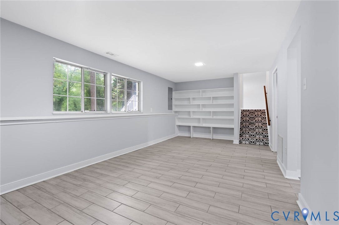 1018 Arch Hill Drive, North Chesterfield, VA 23236 Lower level Great Room w FP & built-ins