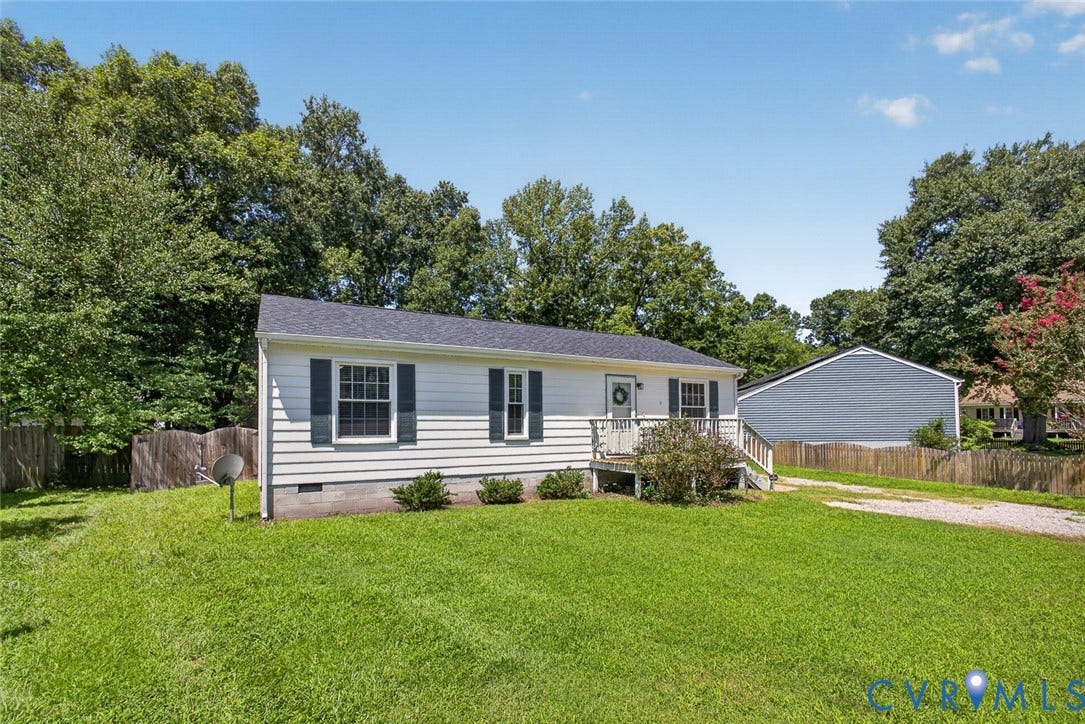 6302 Phobus Court, Richmond, VA 23234 White siding exterior with dark green shutters