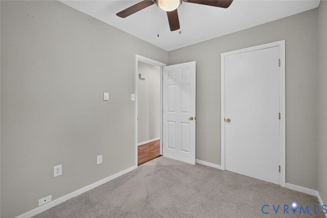 6302 Phobus Court, Richmond, VA 23234 Carpeted room with light gray walls, white trim, and a ceiling fan