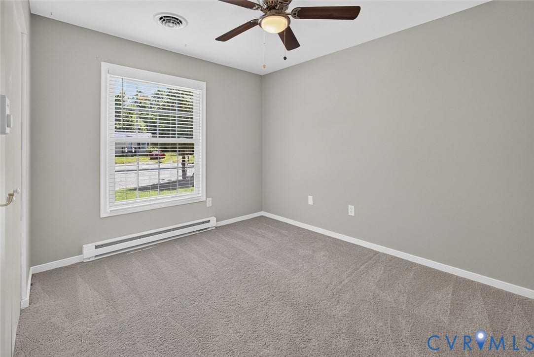 6302 Phobus Court, Richmond, VA 23234 Room featuring light gray walls, neutral-tone carpeting, and a ceiling fan with integrated lighting