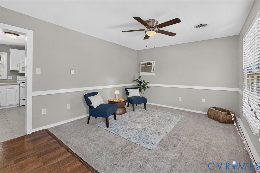 6302 Phobus Court, Richmond, VA 23234 Carpeted interior space with light gray walls and white chair rail molding