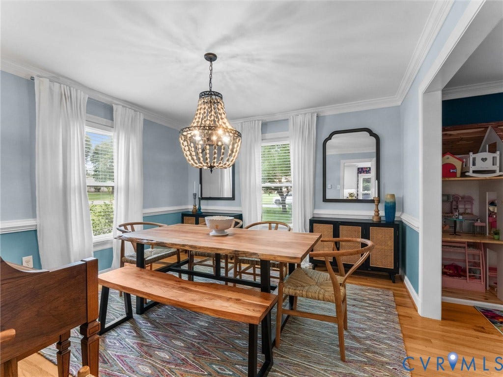 8216 Indian Springs Road, Richmond, VA 23237 Dining area featuring a beaded chandelier, light wood-finish flooring, and crown molding