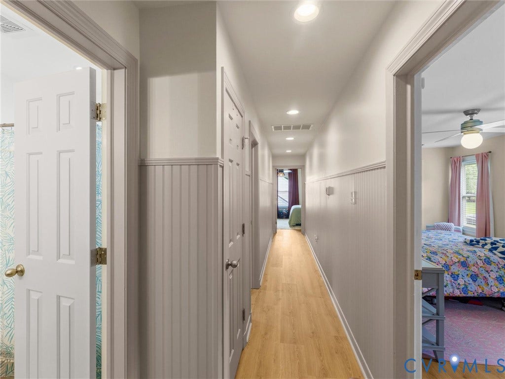 8216 Indian Springs Road, Richmond, VA 23237 Hallway featuring beadboard wainscoting, wood-finish flooring, and recessed lighting