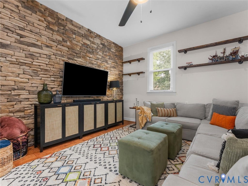 8216 Indian Springs Road, Richmond, VA 23237 Accent wall featuring stacked stone masonry