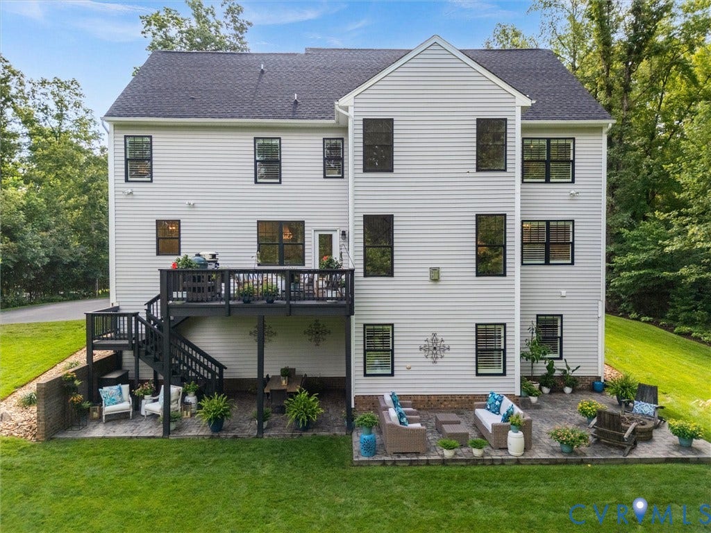 3647 Walkers Creek, Powhatan, VA 23139 Multi-level exterior with light-toned siding and dark-framed windows