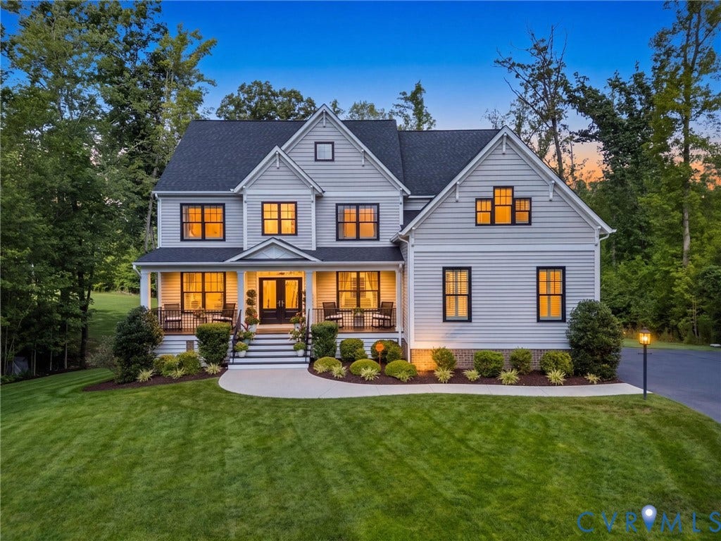 3647 Walkers Creek, Powhatan, VA 23139 Siding exterior with dark-trimmed windows, a covered front porch, and a paved walkway