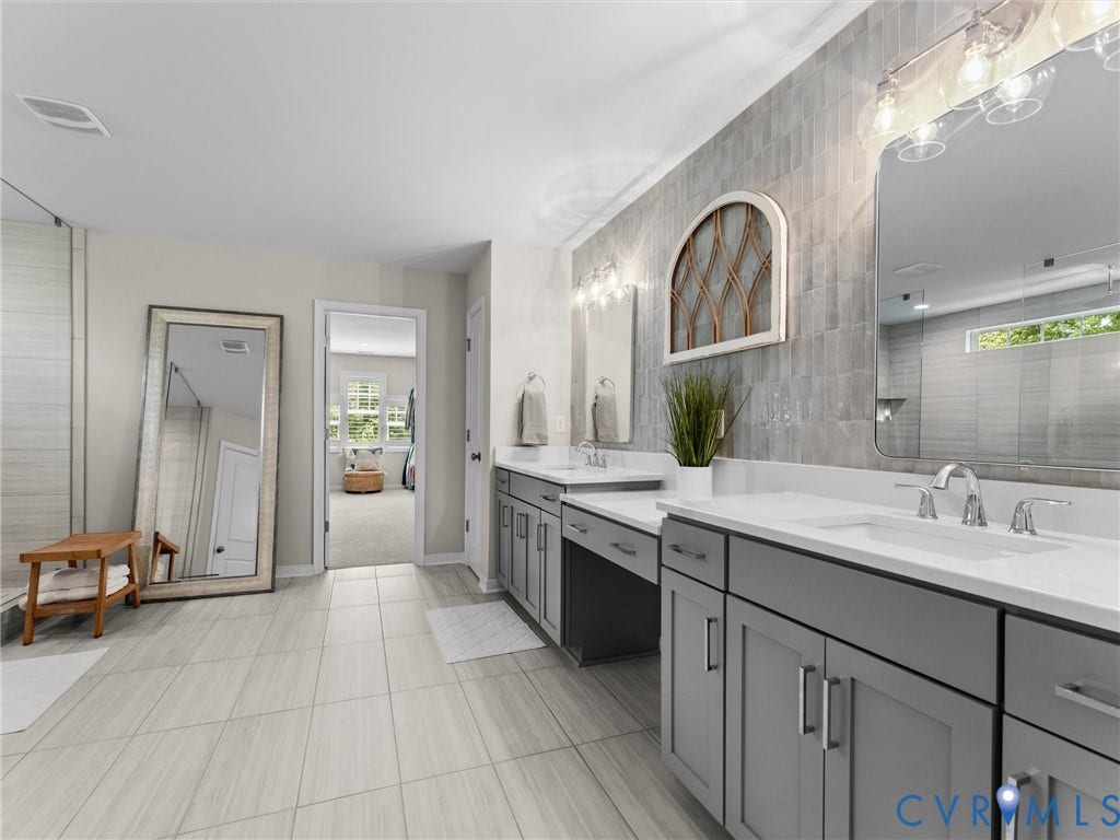 3647 Walkers Creek, Powhatan, VA 23139 Dual vanity with gray cabinetry, white countertops, and chrome fixtures