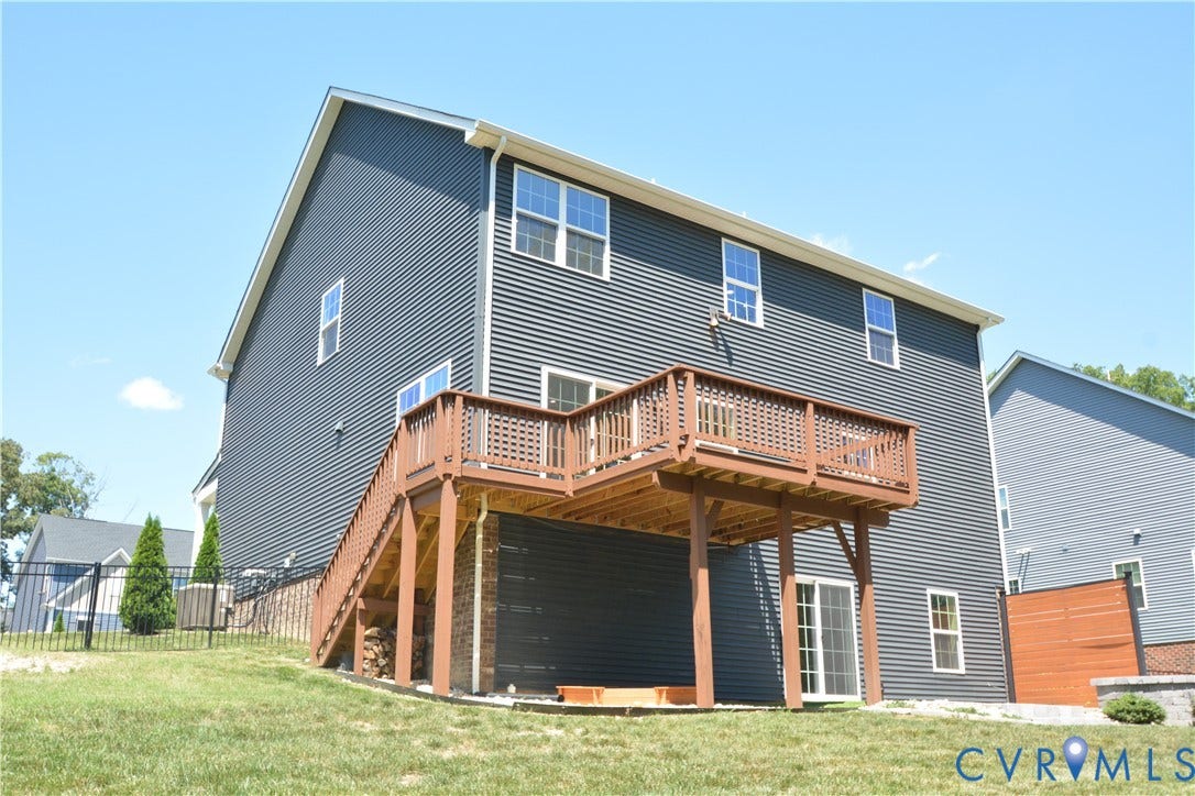 9201 Brett Drive, Bayhill Pointe West, Chesterfield, VA 23112 Two-story residence featuring dark gray siding and white trim
