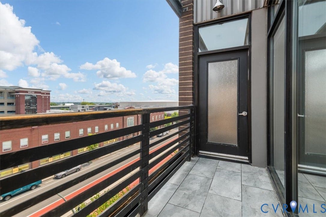 1333 Broad Street, #510, Ironhouse Place Condominiums, Richmond, VA 23220 Private balcony featuring tile flooring and a black metal railing