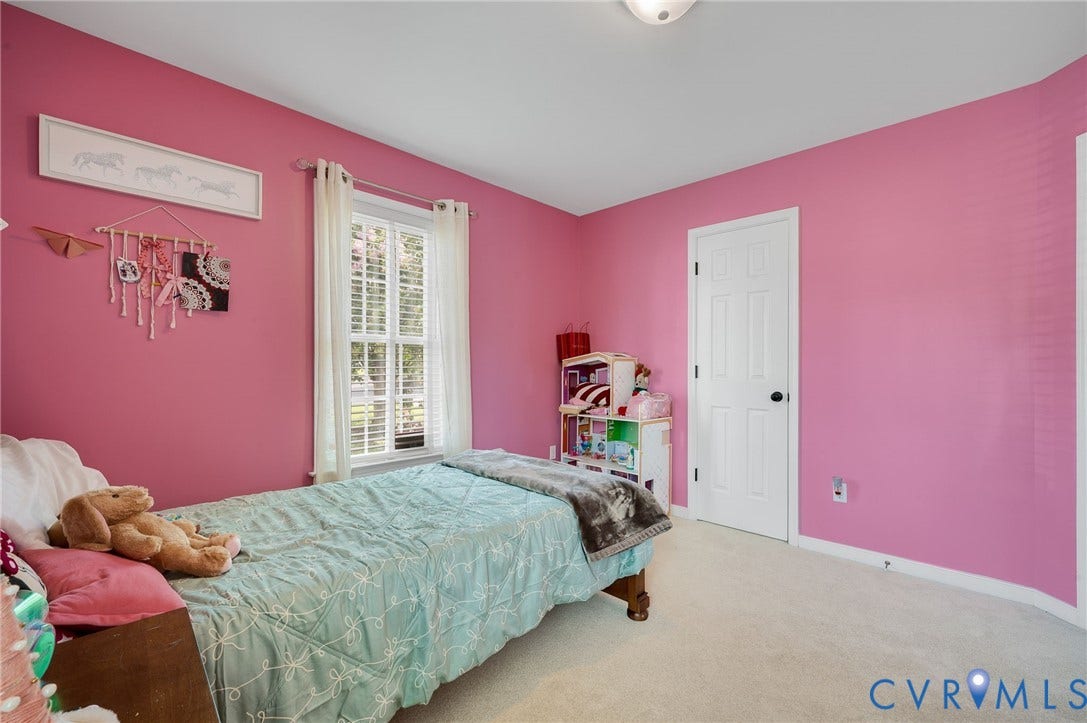 5612 Jessup Station Place, Chesterfield, VA 23234 Room featuring a window with white blinds, white trim, and a curtain rod