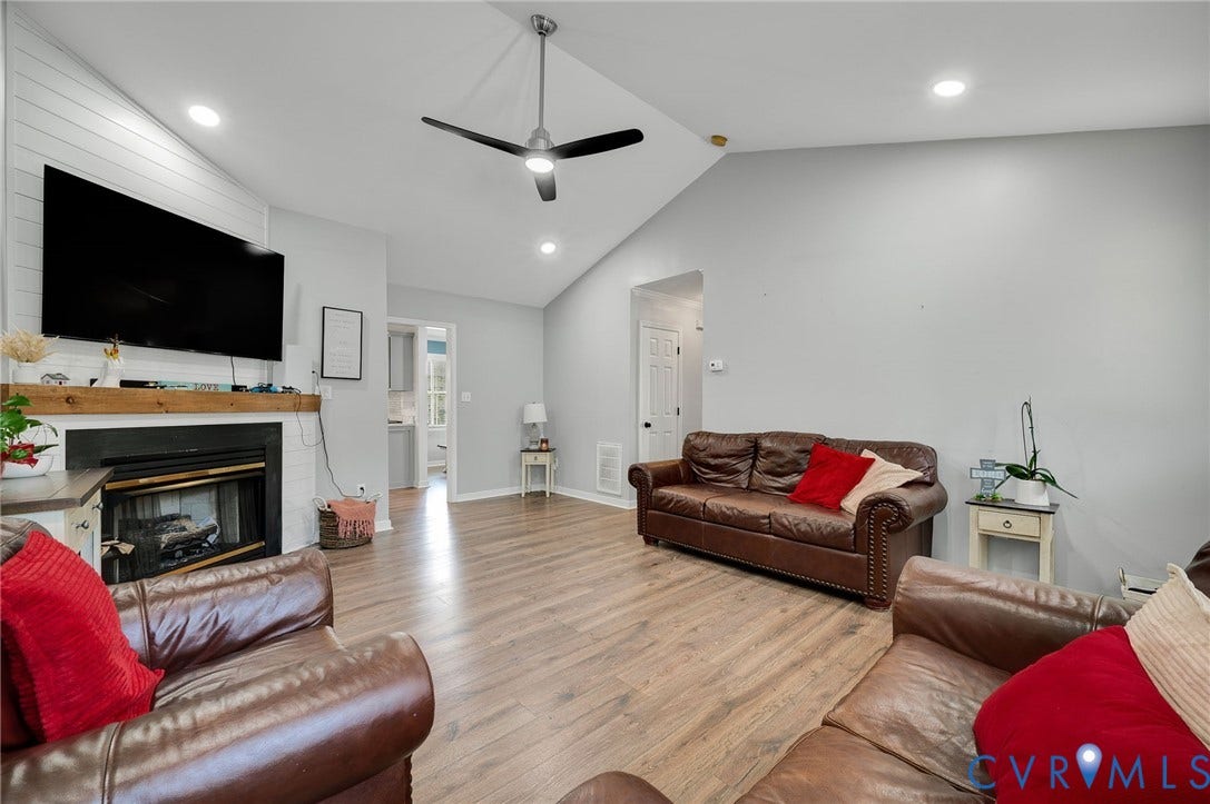 5612 Jessup Station Place, Chesterfield, VA 23234 Living room featuring wood-finish flooring, vaulted ceilings, and recessed lighting
