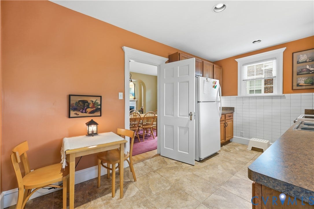 4207 W Grace Street, Sauer's Gardens, Richmond, VA 23230 Kitchen featuring recessed lighting, tile flooring, white subway tile backsplash, wood-finish cabinetry, and a refrigerator