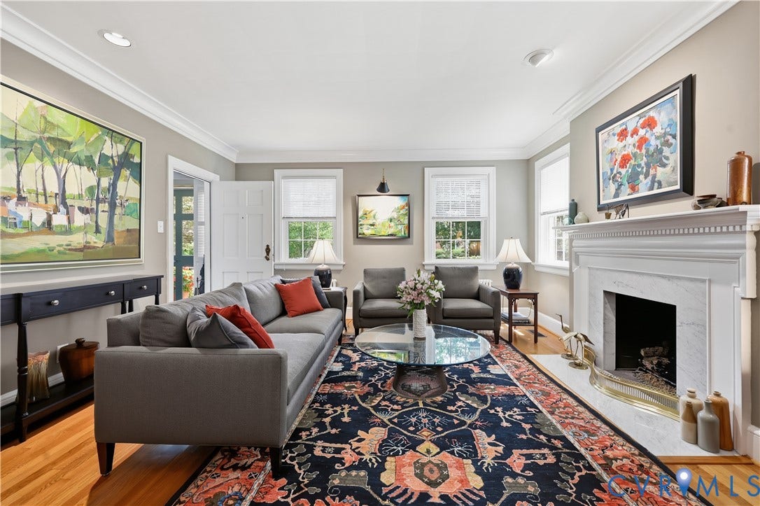 4207 W Grace Street, Sauer's Gardens, Richmond, VA 23230 Living room featuring hardwood flooring, crown molding, multiple windows, a marble fireplace, and recessed lighting