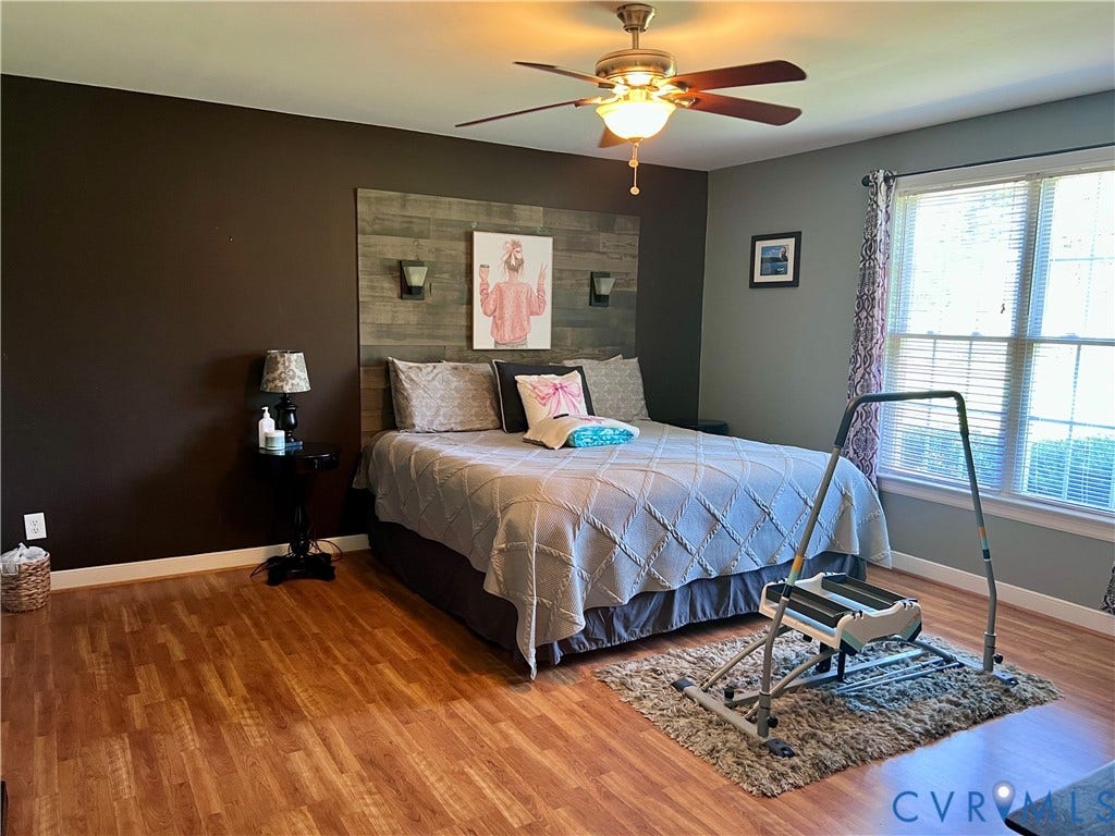 2301 Graceland Drive, Powhatan, VA 23139 Spacious interior featuring wood-finish flooring and a ceiling fan