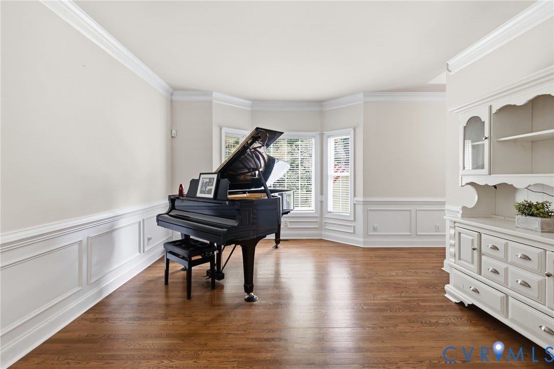 8343 Shagreen Court, The Highlands, Chesterfield, VA 23838 Hardwood flooring throughout, extensive crown molding, wainscoting, and large bay windows with blinds