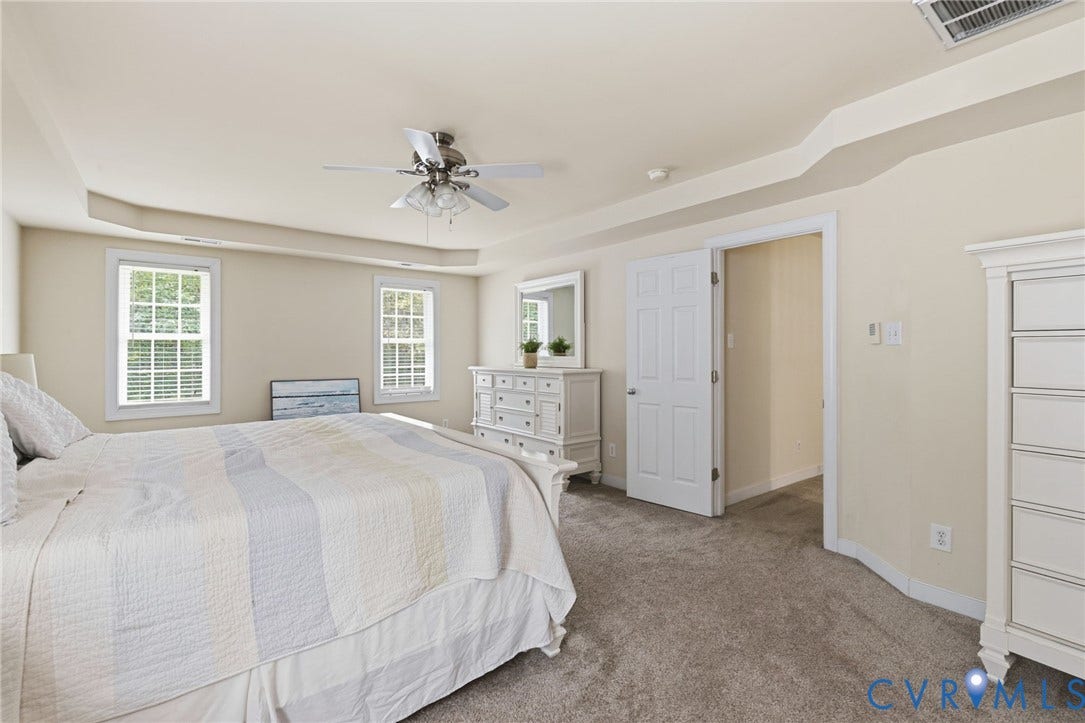 8343 Shagreen Court, The Highlands, Chesterfield, VA 23838 Recessed ceiling, neutral wall paint, two double-hung windows, ceiling fan with light fixture, and wall-to-wall carpeting