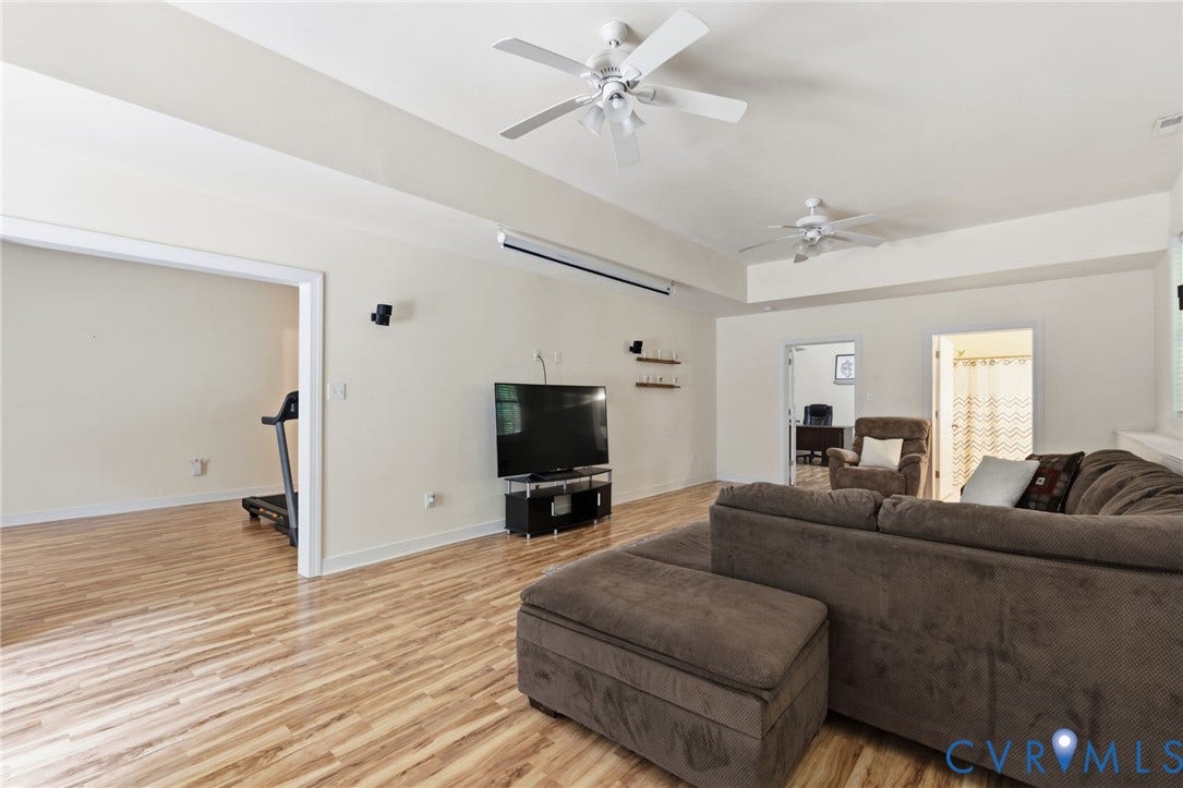 8343 Shagreen Court, The Highlands, Chesterfield, VA 23838 Open concept living area with wood-finish flooring