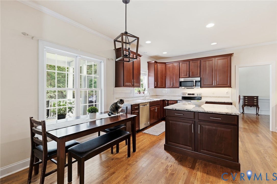 8343 Shagreen Court, The Highlands, Chesterfield, VA 23838 Hardwood flooring, dark wood cabinetry, stainless steel appliances, granite countertops, and recessed lighting