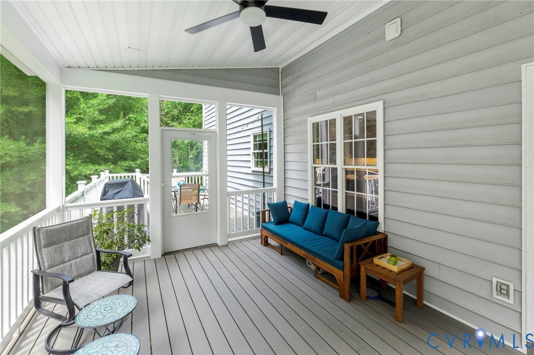 8343 Shagreen Court, The Highlands, Chesterfield, VA 23838 Screened porch with a ceiling fan, white railings, and a door leading to an outdoor deck