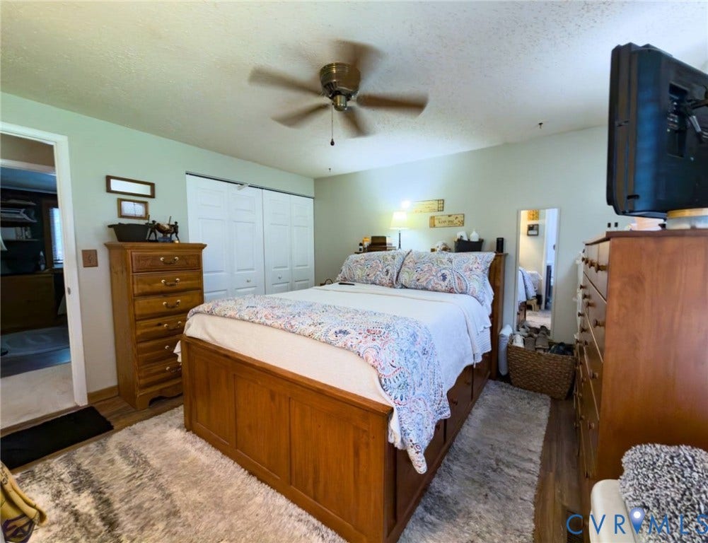 4900 Cord Court, Bridgewood, Glen Allen, VA 23060 Wood-finish flooring with a ceiling fan