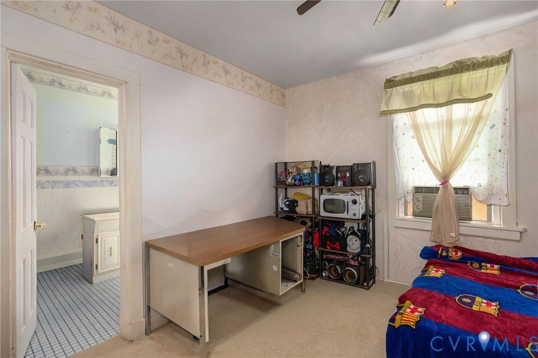 5927 Swanson Road, Richmond, VA 23225 Versatile bedroom with ample natural light from dual windows featuring soft valance treatments