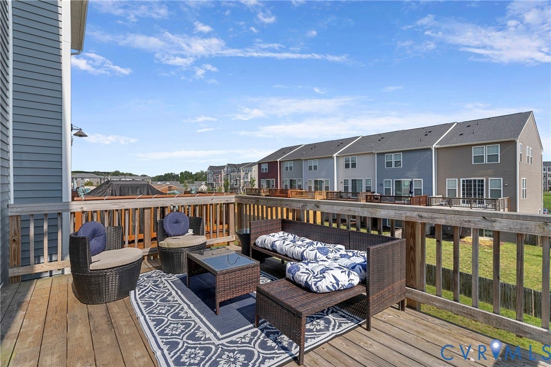 Wood deck with a slatted railing