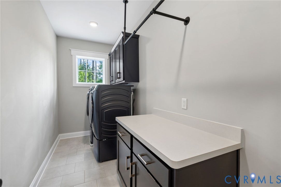 7237 Bonallack Bend, Carlton Ridge, Moseley, VA 23120 Tile flooring, built-in cabinetry, countertop space, and a fun hanging rod. Washer and Dryer to convey