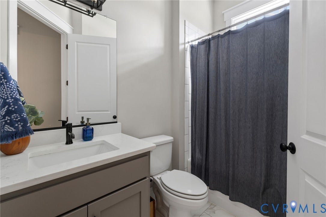 7237 Bonallack Bend, Carlton Ridge, Moseley, VA 23120 1st floor full bathroom with quartz countertop, tiled floors and shower surround