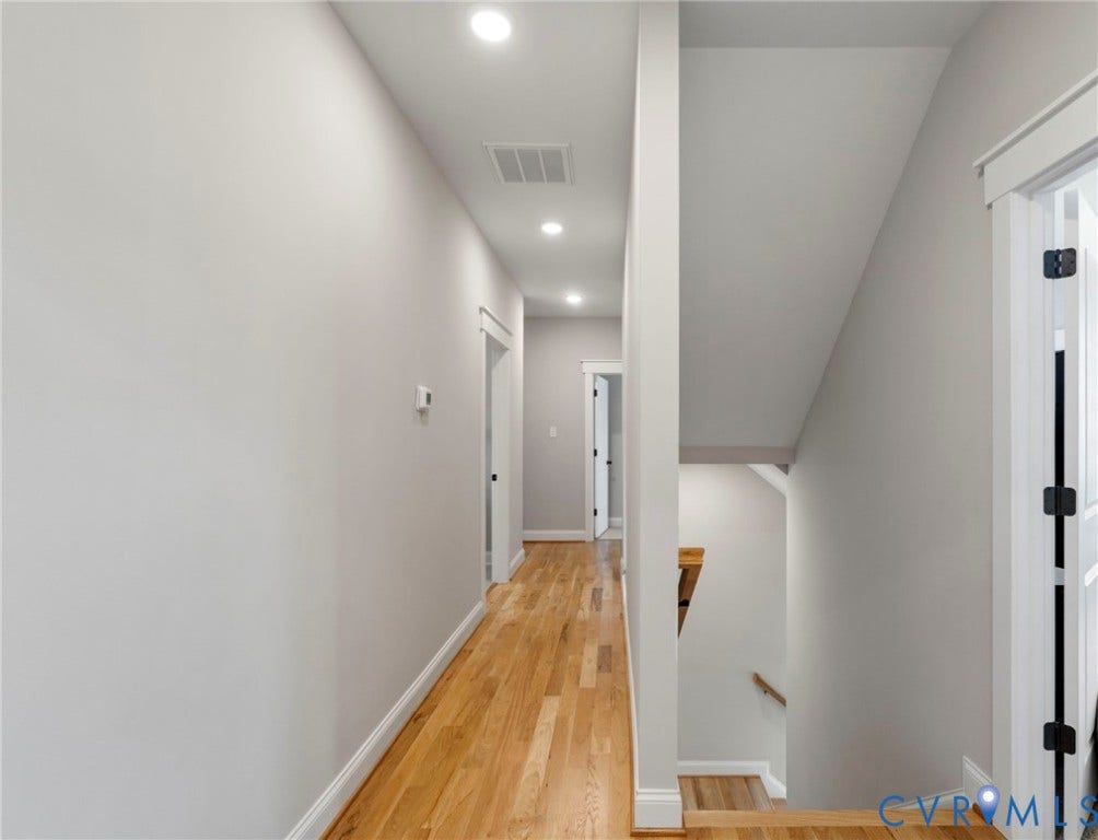 7237 Bonallack Bend, Carlton Ridge, Moseley, VA 23120 2nd floor hallway with wood floors, 9' ceilings on second level