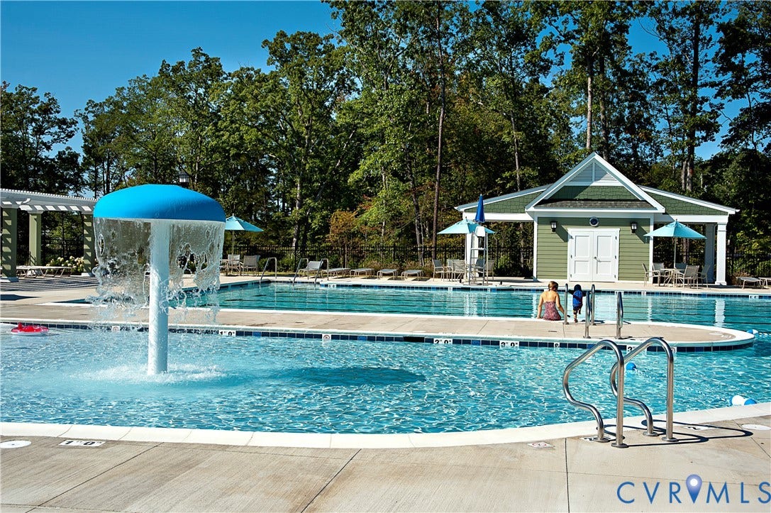 7237 Bonallack Bend, Carlton Ridge, Moseley, VA 23120 2nd community swimming pool complex featuring a water play structure, a separate shallow area, and a dedicated pool house with covered patio areas