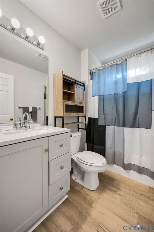10620 Correnty Drive, Henrico, VA 23059 Bathroom featuring a single vanity with light grey cabinetry, gold-tone hardware, and a white countertop