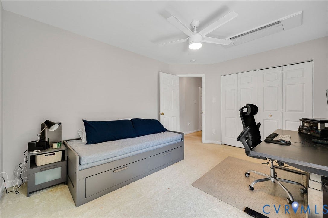 10620 Correnty Drive, Henrico, VA 23059 Light neutral wall color with white bi-fold closet doors, white ceiling fan with integrated lighting, recessed lighting, and carpet flooring