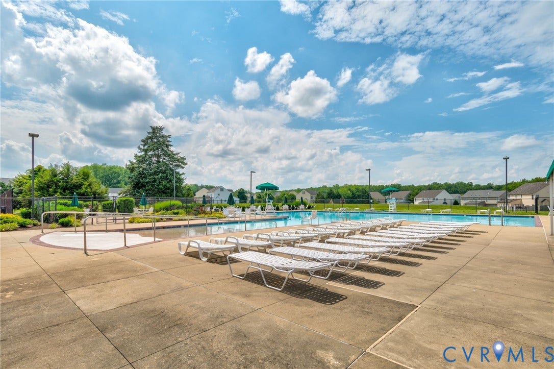 10620 Correnty Drive, Henrico, VA 23059 Expansive outdoor swimming pool with surrounding concrete decking