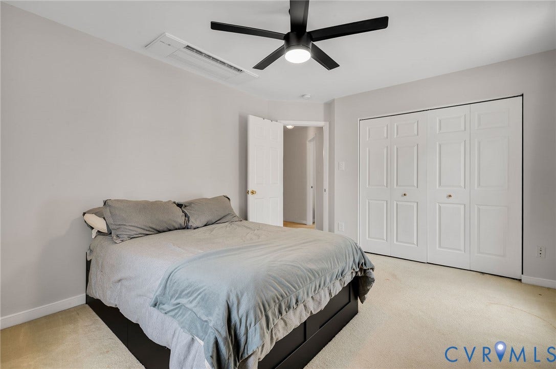 10620 Correnty Drive, Henrico, VA 23059 Carpeted bedroom with a matte black ceiling fan, recessed lighting, and a wall-mounted cassette air conditioning unit